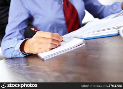 Business woman at office. Business woman at office sitting at table and working