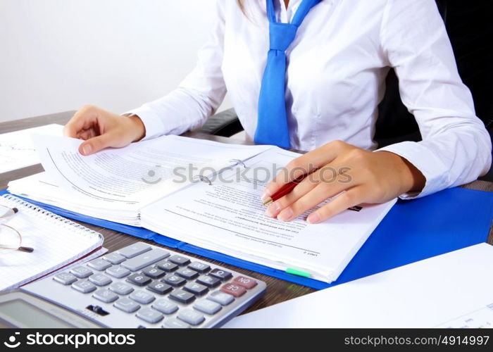 Business woman at office. Business woman at office sitting at table and working