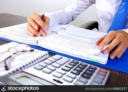 Business woman at office. Business woman at office sitting at table and working