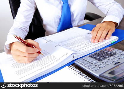 Business woman at office. Business woman at office sitting at table and working