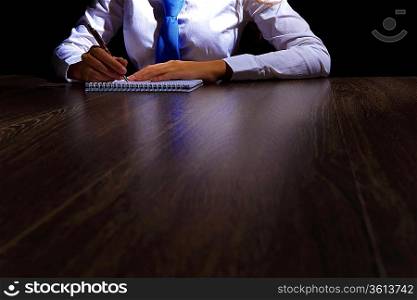 Business woman at office sitting at table and working