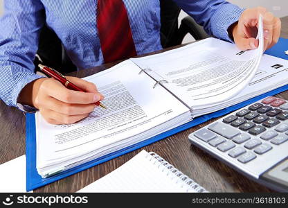 Business woman at office sitting at table and working