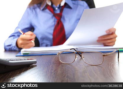 Business woman at office sitting at table and working