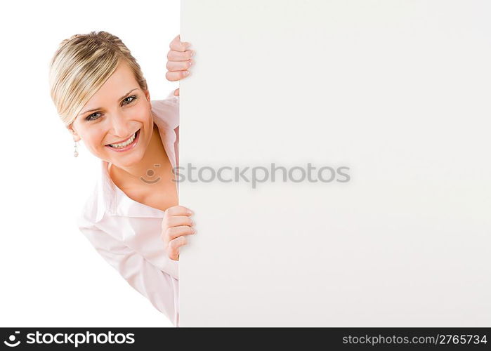 Business woman behind blank banner landscape look at camera