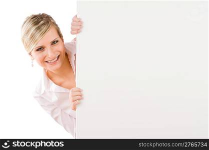 Business woman behind blank banner landscape look at camera