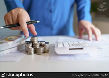 Business woman calculating financial statement on calculator income tax online return and payment