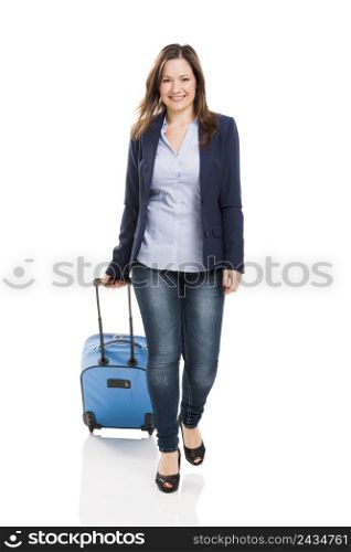 Business woman carrying a suitcase, isolated over white background