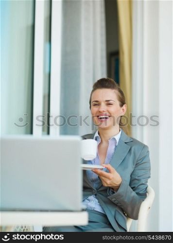 Business woman drinking coffee