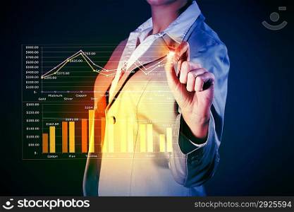 Business woman drowing media graphs