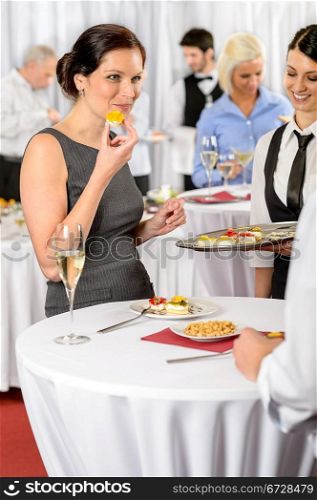 Business woman eat dessert from catering service during company meeting