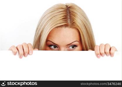 business woman hidden behind a white sheet of paper