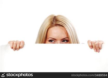 business woman hidden behind a white sheet of paper