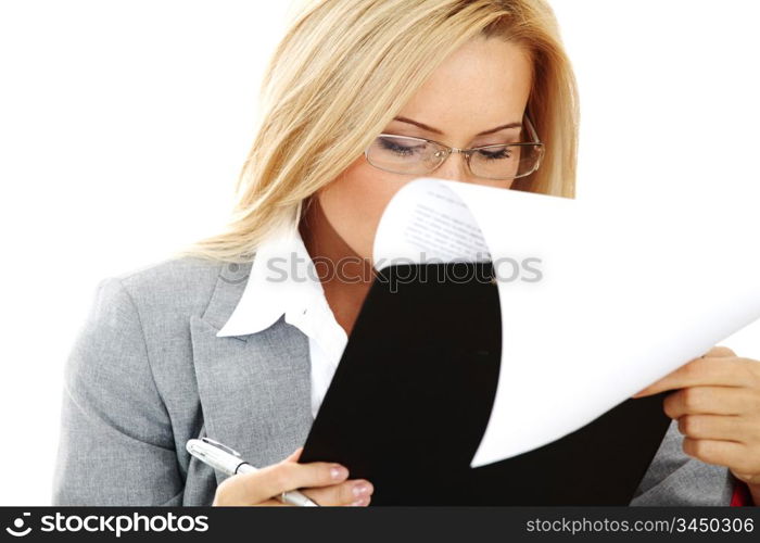 business woman hold a folder of papers and write