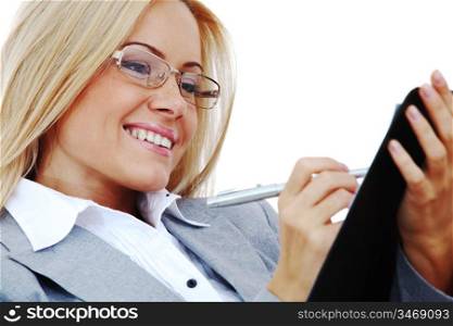 business woman hold a folder of papers and write