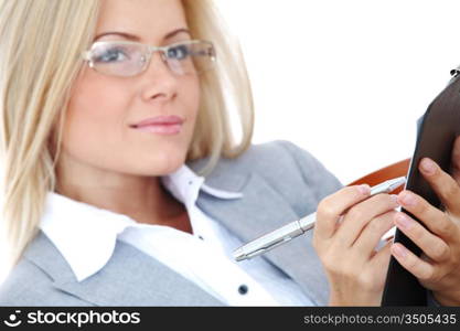 business woman hold a folder of papers and write