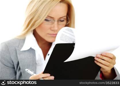 business woman hold a folder of papers and write