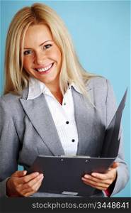business woman hold a folder of papers on a blue background