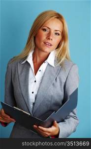 business woman hold a folder of papers on a blue background