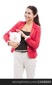 Business woman holding a piggy bank on the hands, isolated over a white background