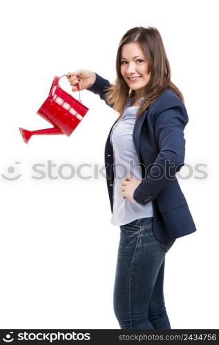 Business woman holding a water can, isolated over white background