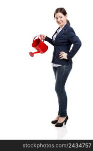 Business woman holding a water can, isolated over white background