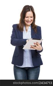 Business woman holding and working with a tablet, isolated over a white background