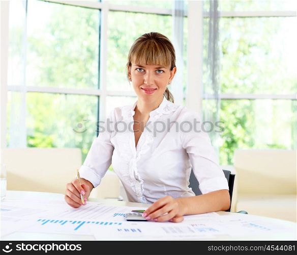 business woman in office working with papers