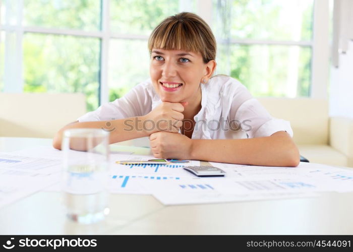 business woman in office working with papers