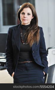 business woman in suit portrait in modern office