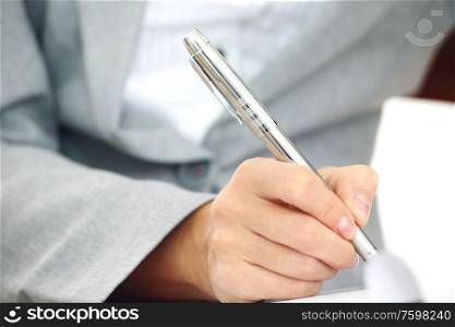 Business woman in suit signing contract with pen, document, paperwork. Business woman sign contract