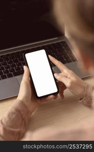 business woman indoors using her mobile phone