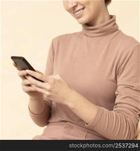 business woman indoors using her mobile phone 3
