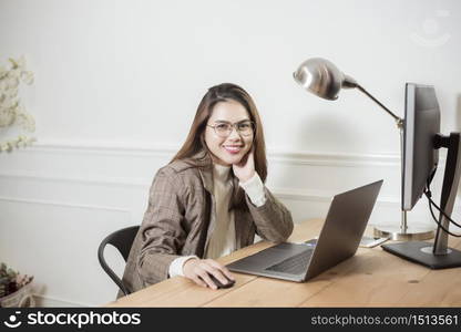 Business woman is working in her office desk