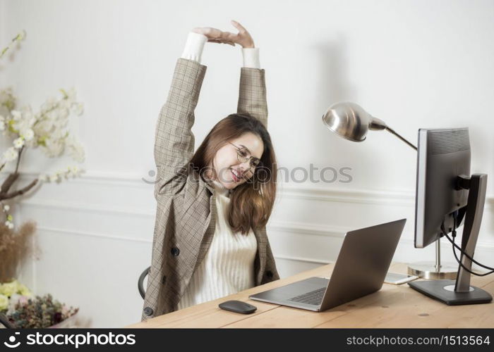 Business woman is working in her office desk