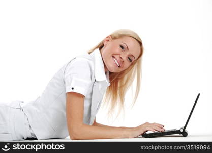 business woman lies and working on laptop