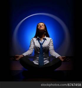 Business woman meditating