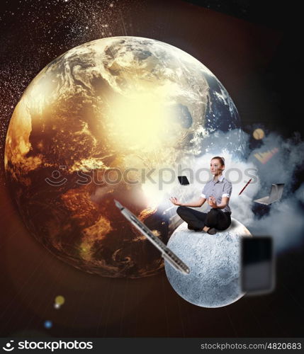 business woman meditating. Businesswoman sitting in lotus flower position against space background with office stuff aloft