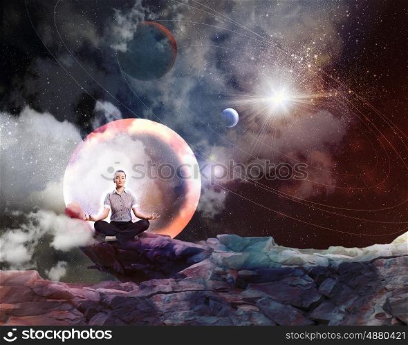 business woman meditating. Businesswoman sitting in lotus flower position against space background