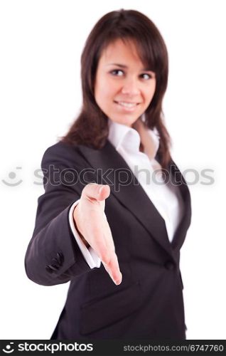 Business woman offering handshake - selective focus on hand