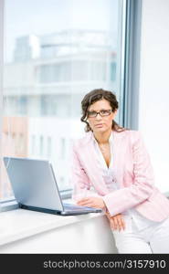 Business woman on a laptop