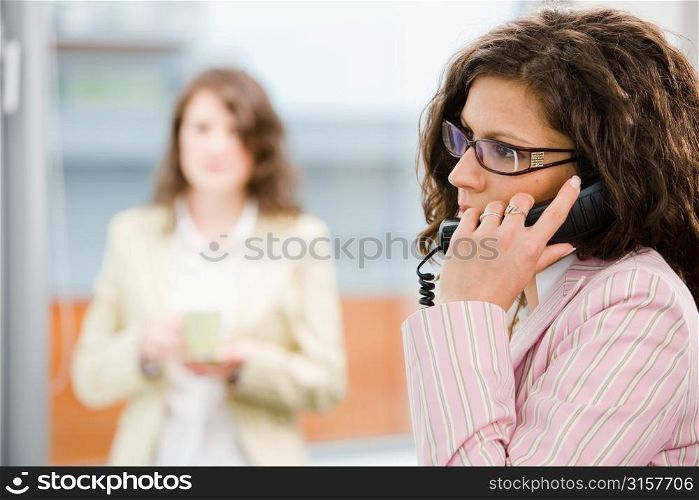 Business woman on a mobile phone