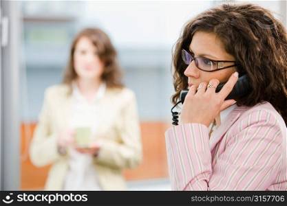 Business woman on a mobile phone