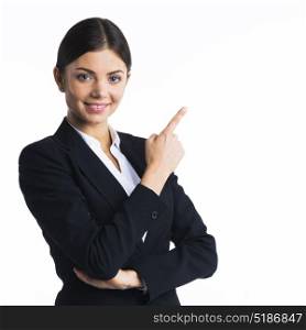 Business woman pointing at copyspace. Business woman pointing at copyspace, isolated on white background