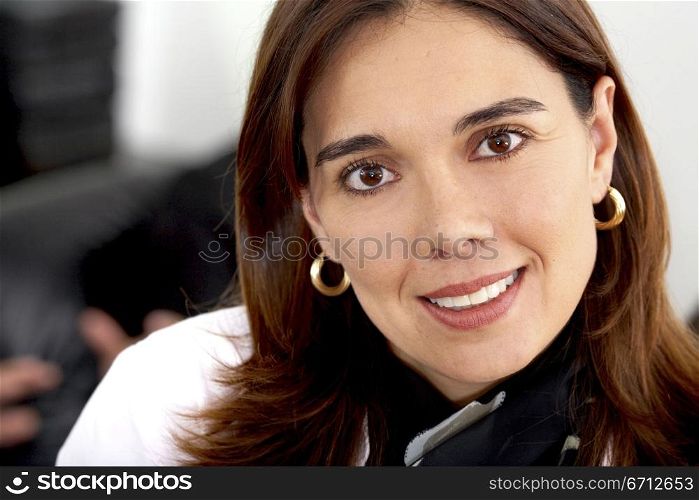 Business woman portrait smiling in an office