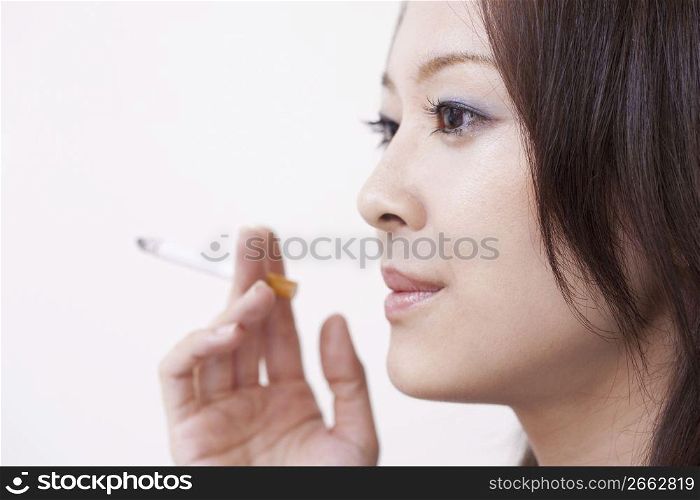 business woman posing with cigarrette
