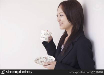 business woman posing with cup