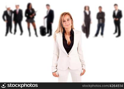 business woman posing with group of people in the back