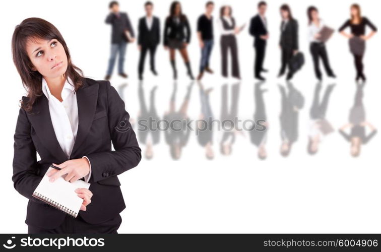 Business woman posing, with people in background