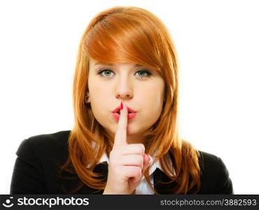Business woman redhaired girl asking for silence or secrecy with finger on lips hush hand gesture. Isolated