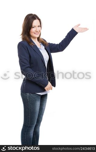Business woman showing something with her left hand and looking to the camera, isolated over white
